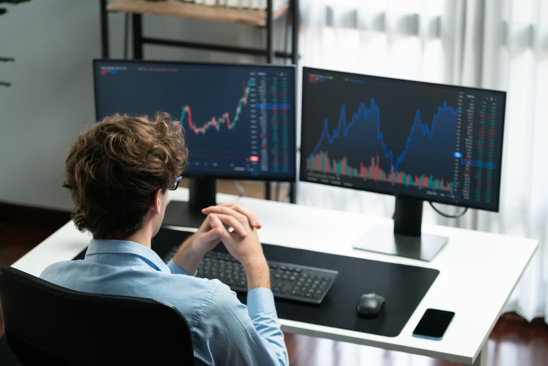 Trader analyzing markets